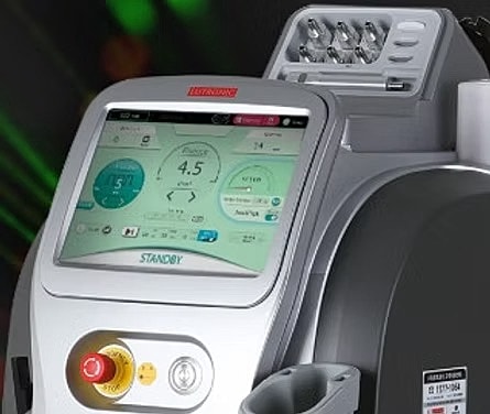 Medical laser machine with touchscreen interface.