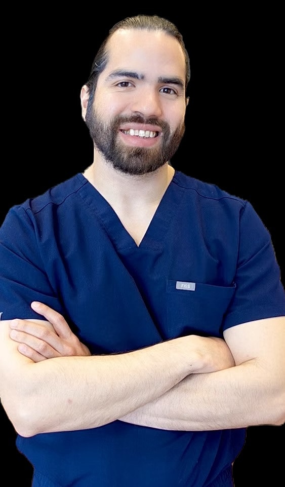 Smiling healthcare professional in medical scrubs.