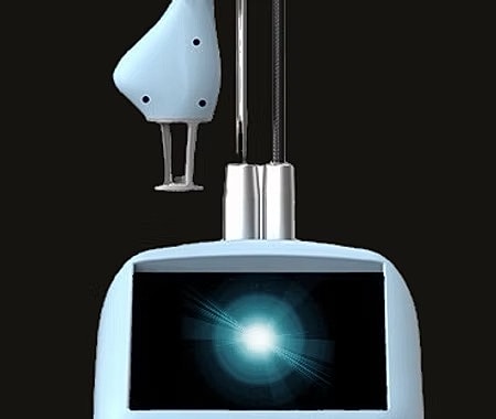 Blue device with a screen and probe attachment.