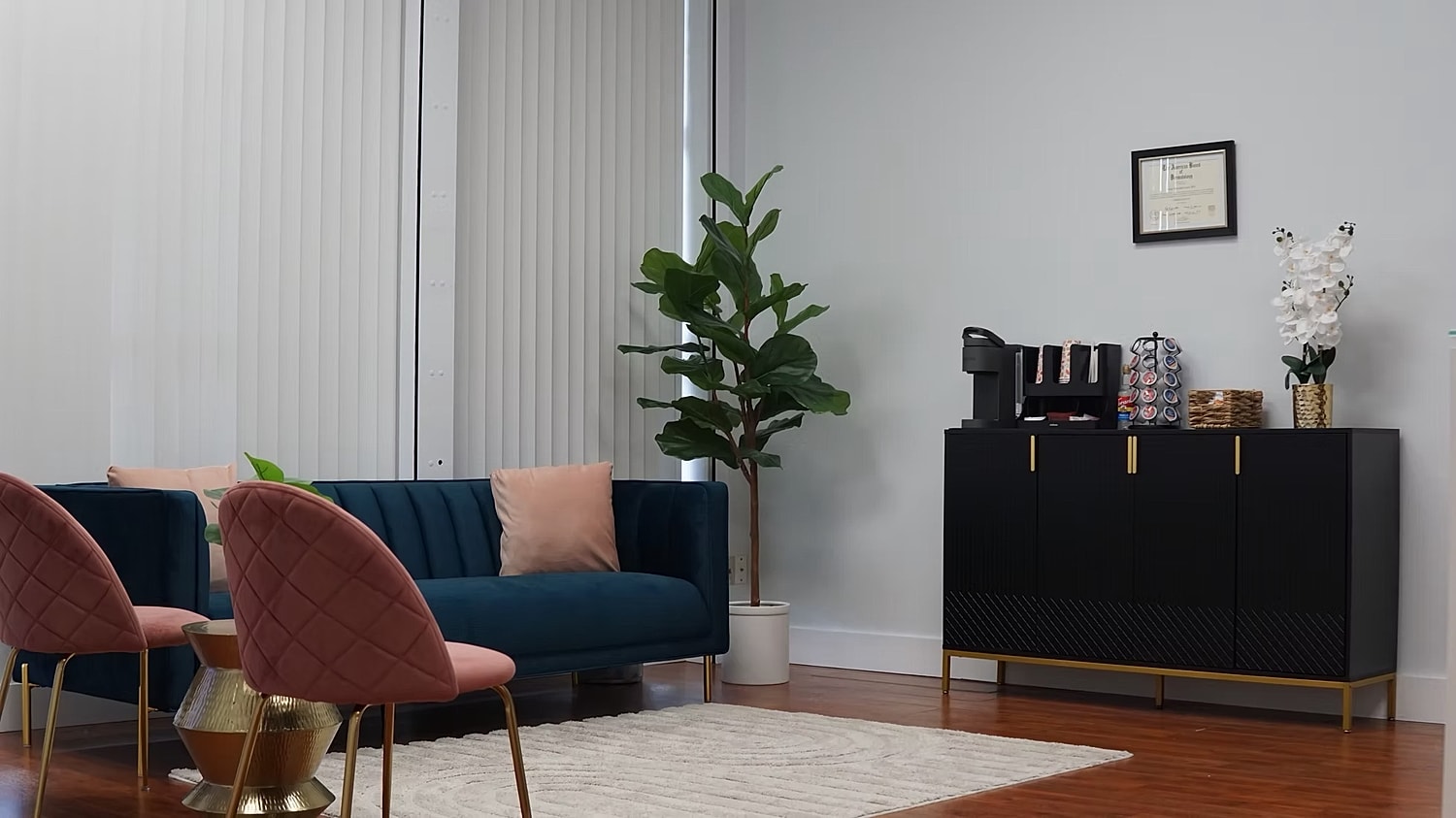 Modern office lounge with stylish furniture and decor.