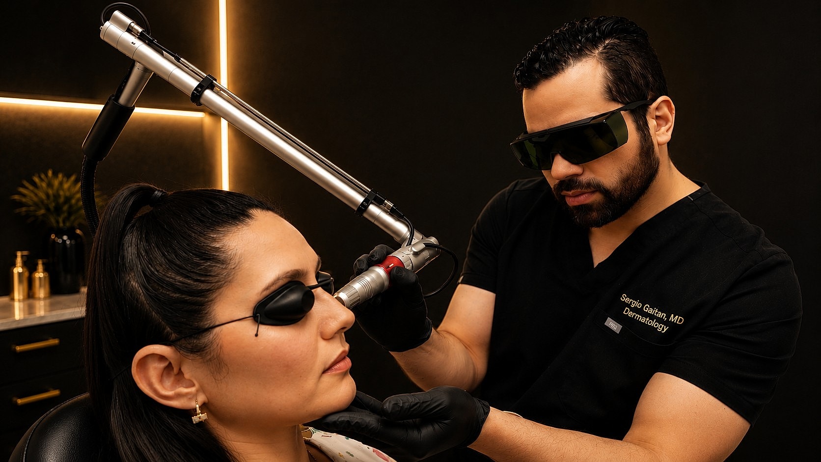 Dermatologist performing laser treatment on patient.