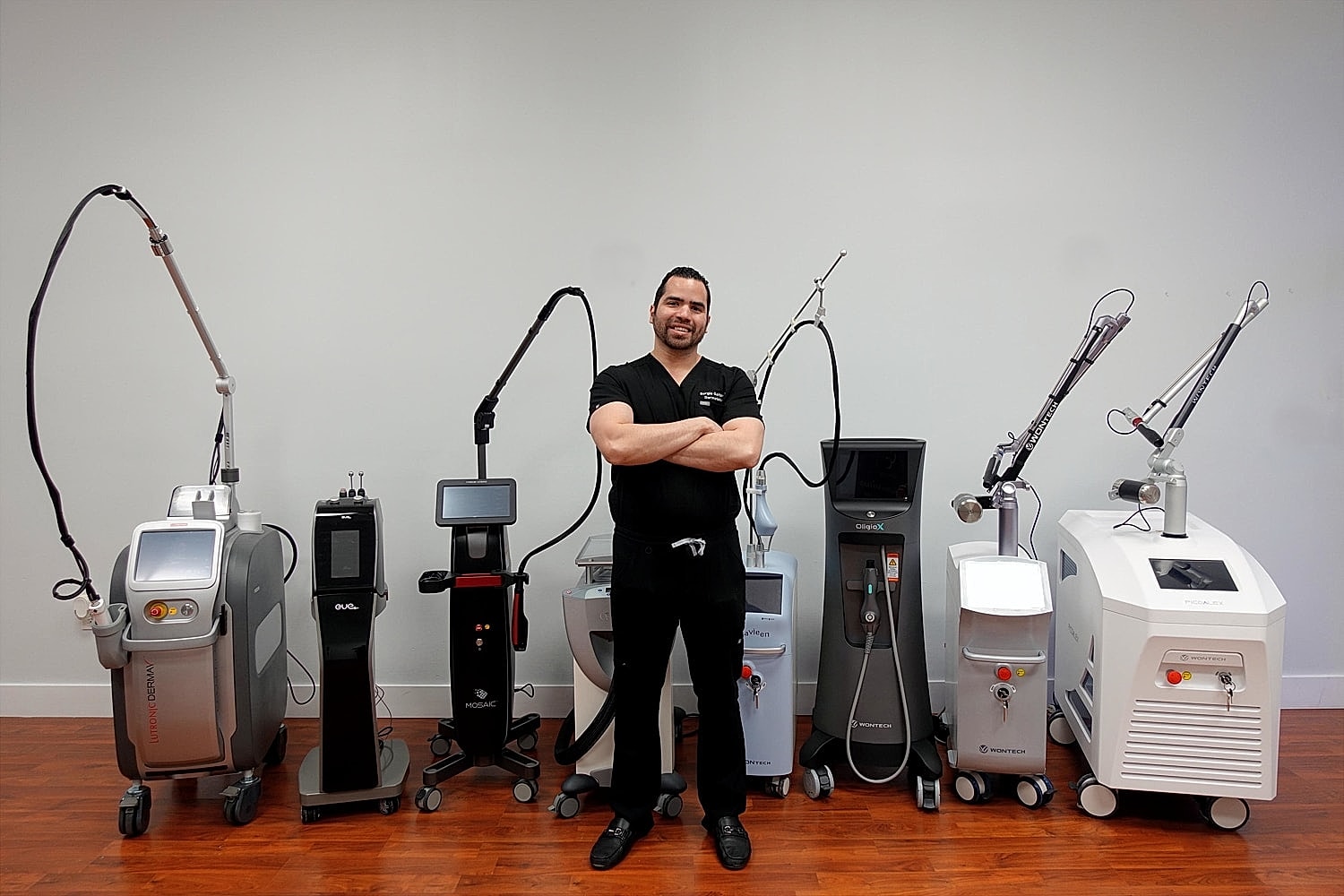 Aesthetic professional with advanced laser equipment.